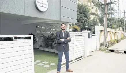  ??  ?? Ritesh Agarwal, founder and CEO of Oravel Stays Ltd, poses for a photograph at an Oyo Townhouse in Bengaluru.