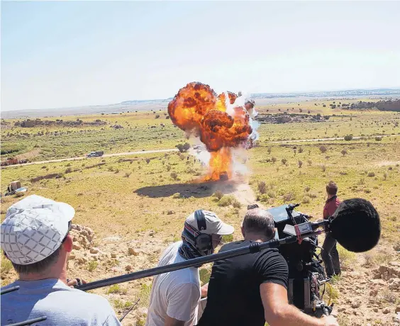  ?? COURTESY OF LOREY SEBASTIAN ?? Eastern New Mexico doubles as West Texas in the film “Hell or High Water.” Here, crews film an explosion.