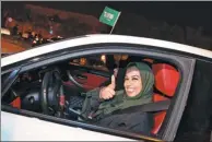  ?? HAMAD I MOHAMMED / REUTERS ?? A Saudi woman celebrates as she drives her car in her neighborho­od in Al Khobar, Saudi Arabia, on Sunday.
