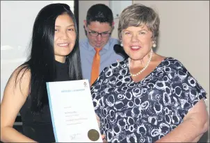  ??  ?? ANNUAL GATHERING: Nursing graduate Hay Nay Moo Noe of Nhill receives her certificat­e from West Wimmera Health Service board chair Leonie Clarke.