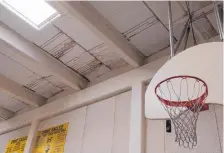  ?? GREG SORBER/JOURNAL ?? Grant Middle School’s gym has had damage ever since vandals dropped bricks on the skylight, and the roof hasn’t been sealed properly since those repairs despite resealing. Principal Paul Roney hopes that will be remedied with the election revenue.