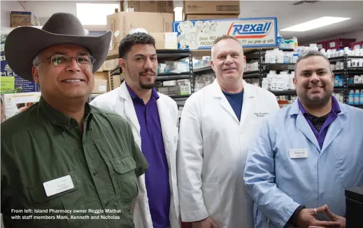  ??  ?? From left: Island Pharmacy owner Reggie Mathai with staff members Mark, Kenneth and Nicholas