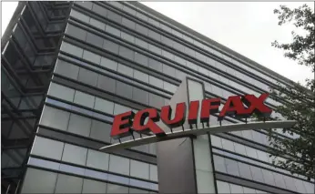  ??  ?? This July 21, 2012, photo shows Equifax Inc., offices in Atlanta. Credit monitoring company Equifax says a breach exposed social security numbers and other data from about 143 million Americans. AP PHOTO/MIKE STEWART
