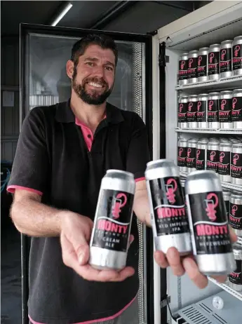  ?? Photo: Matthew Newton ?? STOKED: Monty Brewing Co's Nathan Semmens with his award-winning Cream Ale, Red Imperial IPA and Hefeweizen brews.