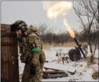  ?? ?? Ukrainians fire on Russian forces.