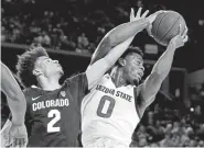  ?? Ralph Freso, The Associated Press ?? Colorado guard Daylen Kountz battles Arizona State’s Luguentz Dort for the ball during the Buffs’ 83-61 loss in Tempe last month.