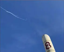  ?? Jason Sellers via Associated Press ?? This photo provided by Jason Sellers shows U.S. Air Force fighter aircraft shooting down a suspected Chinese spy balloon off the Carolina coast on Feb. 4.