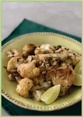  ?? ?? Florets of cauliflowe­r, browned and coated with spices, become a main course when teamed with pasta or farro.