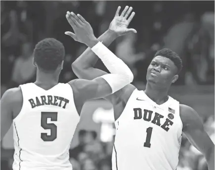  ?? ROB KINNAN/USA TODAY SPORTS ?? Zion Williamson and R.J. Barrett are two of four freshmen who start when healthy for No. 2 Duke.