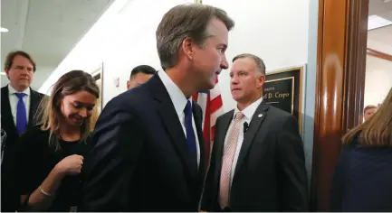  ??  ?? SUPREME COURT JUSTICE nominee Brett Kavanaugh walks into a meeting last week in Washington.