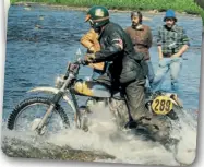  ??  ?? Arthur Browning on his Triumph causes a splash during the 1973 ISDT. Arthur was an outstandin­g rider being successful in trials, enduro and scrambling as well as being a profession­al speedway rider