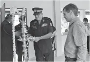  ??  ?? Lighting of oil lamp by Major General Kumudu Perera, Security Forces Commander Wanni and Steven Enderby Group CEO Hemas Holdings