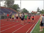  ?? FREEMAN FILE PHOTO ?? Runners get ready at the starting line at a previous BOnteora Mile. This year’s race is scheduled to take place June 9 at Dietz Stadium.