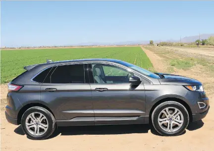  ?? G R A E ME F L E T C H E R / D R I V I NG ?? The new Ford Edge is priced at $ 31,999 for the SE front- wheel- drive model, while the SEL comes in at $ 35,099.