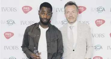  ??  ?? 0 Fraser T Smith and Dave at the Ivor Novello Awards 2018; and main picture of Smith by Solve Sundsbo