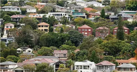  ??  ?? Strong demand: A file picture showing houses in the suburb of Bellevue Hill in Sydney. Demand for housing in this city remains strong as buyers appear to conclude city property is a one-way bet and keep ratcheting up record debt. – Bloomberg