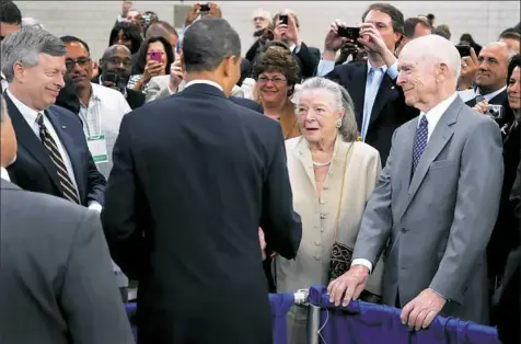  ??  ?? President Barack Obama greets Elsie and Henry Hillman, right, after his speech to an audience at Carnegie Mellon University on June 2, 2010.