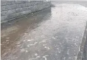  ??  ?? READEr SLIPPy FEEt sENt IN tHE PICturE OF tHE ICE ON tHE PAvEMENt At RENNELL ROAD.