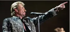  ?? Foto: Fred Dufour, afp ?? Mit Risikofreu­de und Durchhalte­vermögen bis ganz nach oben: Das war die Botschaft des „französisc­hen Elvis“Johnny Hallyday.