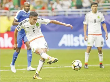  ??  ?? Edson Alvarez #6 of Mexico scores his goal in the second half during the 2017 CONCACAF Gold Cup at Alamodome in San Antonio,Texas. - AFP photo