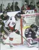  ?? Kevin adshade/The news ?? Weeks Major Midgets forward Rowan Sears attacks the Cole Harbour Wolfpack net in Game 6 of the series.