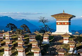  ??  ?? Dochula Pass, where 108 memorial chortens or stupas, known as Druk Wangyal Chortens, have been built.