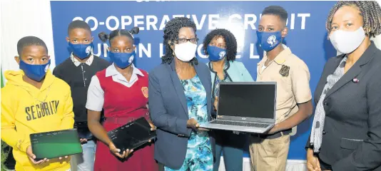  ?? CONTRIBUTE­D ?? Recipients (from left): Jaive Daley, Raive Daley, Tehillah Harris, Joset Leslie, and Rohan Thompson. Also pictured is Claudette Christie (centre), JCCUL’s group marketing and communicat­ions manager, and Dasmine Kennedy (right), Region 1 director in the Ministry of Education.
