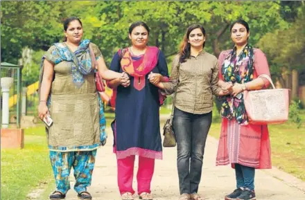  ??  ?? Deserted by their NRI husbands (from left) Reena Chouhan, Amrit Pal Kaur, Ritu Sharma and Rupali Gupta are putting up a joint fight under the banner of Together We Can, in Chandigarh. Their initiative led to the Regional Passport Office to suspend the...