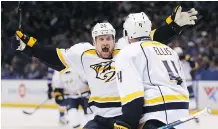  ?? JEFF ROBERSON/THE ASSOCIATED PRESS ?? Nashville Predators left wing Cody McLeod, left, seen celebratin­g a goal with defenceman Ryan Ellis on Friday in St. Louis, says Nashville “has been a great place to play.”