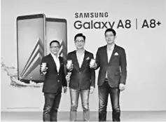  ??  ?? (From left) Samsung Malaysia Electronic­s head of IT and Mobile Business Liew Kian Meng, president Yoonsoo Kim, and business director of IT and Mobile Business Yoo Jin Hyun, are seen during the launch of the all-new Samsung Galaxy A8 (2018) & A8+ (2018).