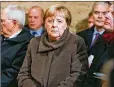  ?? CHRISTIAN MARQUARDT / GETTY IMAGES ?? Above: German Chancellor Angela Merkel attends a ceremony in the Chapel of Reconcilia­tion during the 30th anniversar­y celebratio­ns.