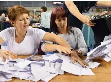  ??  ?? Day of reckoning: Counting votes on election night