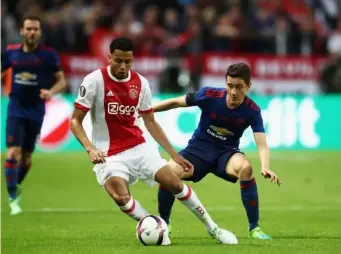  ??  ?? Riedewald in action for Ajax last season (Getty)