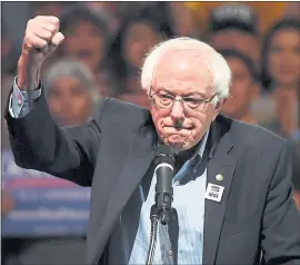  ?? PHOTOS BY ETHAN MILLER, GETTY IMAGES ?? Bernie Sanders: “We have got to end that hatred, that bigotry that is sweeping this country.”