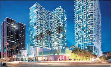  ?? Stanley Saitowitz Natoma Architects Inc. ?? A RENDERING OF the Palladium Residences, two 30-story towers planned for Hollywood. The project has put developer Crescent Heights at odds with the AIDS Healthcare Foundation, which would be its neighbor.