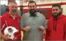  ?? SUBMITTED PHOTO ?? From left, VVS football coach Gary Oliver, Detroit Lions head coach Matt Patricia, and VVS senior quarterbac­k Alex Oliver pause for a moment during Patricia’s surprise visit to his alma mater.