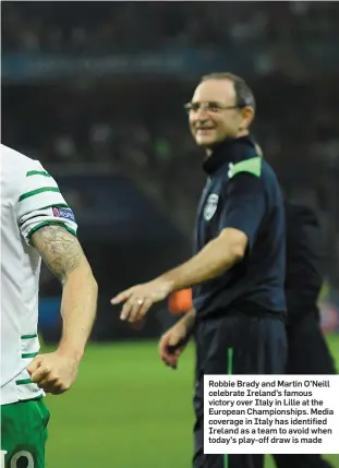  ??  ?? Robbie Brady and Martin O’Neill celebrate Ireland’s famous victory over Italy in Lille at the European Championsh­ips. Media coverage in Italy has identified Ireland as a team to avoid when today’s play-off draw is made