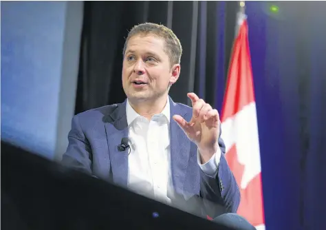  ?? JUSTIN TANG CP ?? Conservati­ve Leader Andrew Scheer takes part in an armchair discussion at the Manning Networking Conference in Ottawa on Saturday. •