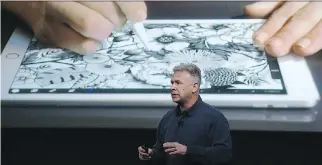  ?? JUSTIN SULLIVAN/GETTY IMAGES ?? Apple executive Phil Schiller announces the new 9.7-inch iPad pro on Monday.