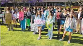  ?? ADRIANA HELDIZ U-T ?? Students gather at the San Diego Unified School District Headquarte­rs on Tuesday in support of reproducti­ve rights.