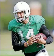  ?? TERRY, THE OKLAHOMAN] [PHOTO BY BRYAN ?? Oklahoma State quarterbac­k Taylor Cornelius carries the ball during a spring practice in Stillwater.