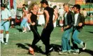  ?? Photograph: c.Paramount/Everett / Rex Features ?? Olivia Newton-John performs the You’re the One That I Want duet in Grease with John Travolta dressed in the famous black outfit that sold at auction for $405,700.