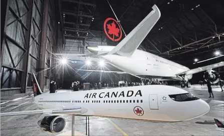 ?? MARK BLINCH
THE CANADIAN PRESS ?? Profits at Canada’s largest airline took a tumble in the third quarter, though revenue gains helped offset a spike in fuel prices.