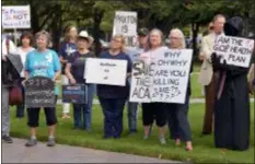  ?? MAX FAULKNER — STAR-TELEGRAM VIA AP ?? Supporters of the Affordable Care Act protest during a rally at Burnett Park in Fort Worth, Texas, Wednesday. Democratic nominee for Texas Attorney General Justin Nelson hosted the Fort Worth Rally for Preexistin­g Coverage Protection.