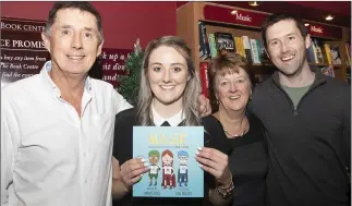  ??  ?? Author Emma Cahill with parents Brian and Geraldine and brother Barry.