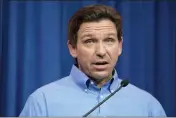  ?? CHARLIE NEIBERGALL — THE ASSOCIATED PRESS FILE ?? Florida Gov. Ron DeSantis speaks during a fundraisin­g picnic for Rep. Randy Feenstra, R-Iowa, on May 13in Sioux Center, Iowa.