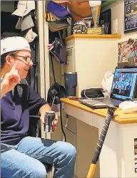  ?? Curran family / Contribute­d photo ?? Curran on a Zoom call with his Staples teammates. Curran says he misses them since school was suspended because of the coronaviru­s pandemic: “It’s heartbreak­ing. My coaches and the players, I haven’t seen them,” but that “I’m fine.”