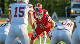  ?? Dave Burbank/Cornell Athletics ?? Jake Stebbins (30), a Seneca Valley graduate who plays at Cornell, is considerin­g a gap semester to extend his eligibilit­y.