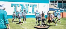  ?? PHOTO COURTESY OF DOLPHINS ?? New Dolphins coach Brian Flores is using his T.N.T. slogan, which stands for “Takes No Talent,” to remind players there are other things they can do to enhance their games.