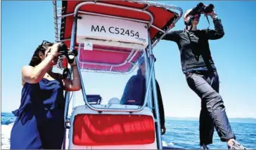  ?? AFP ?? Marion Leclerc and Larene Trudelle scouring the Mediterran­ean on a boat belonging to scientific research group GIS3M. Leclerc says she’s been disappoint­ed by human behaviour since lockdowns eased in France.